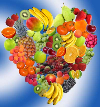 A heart drawn with different kinds of fruits